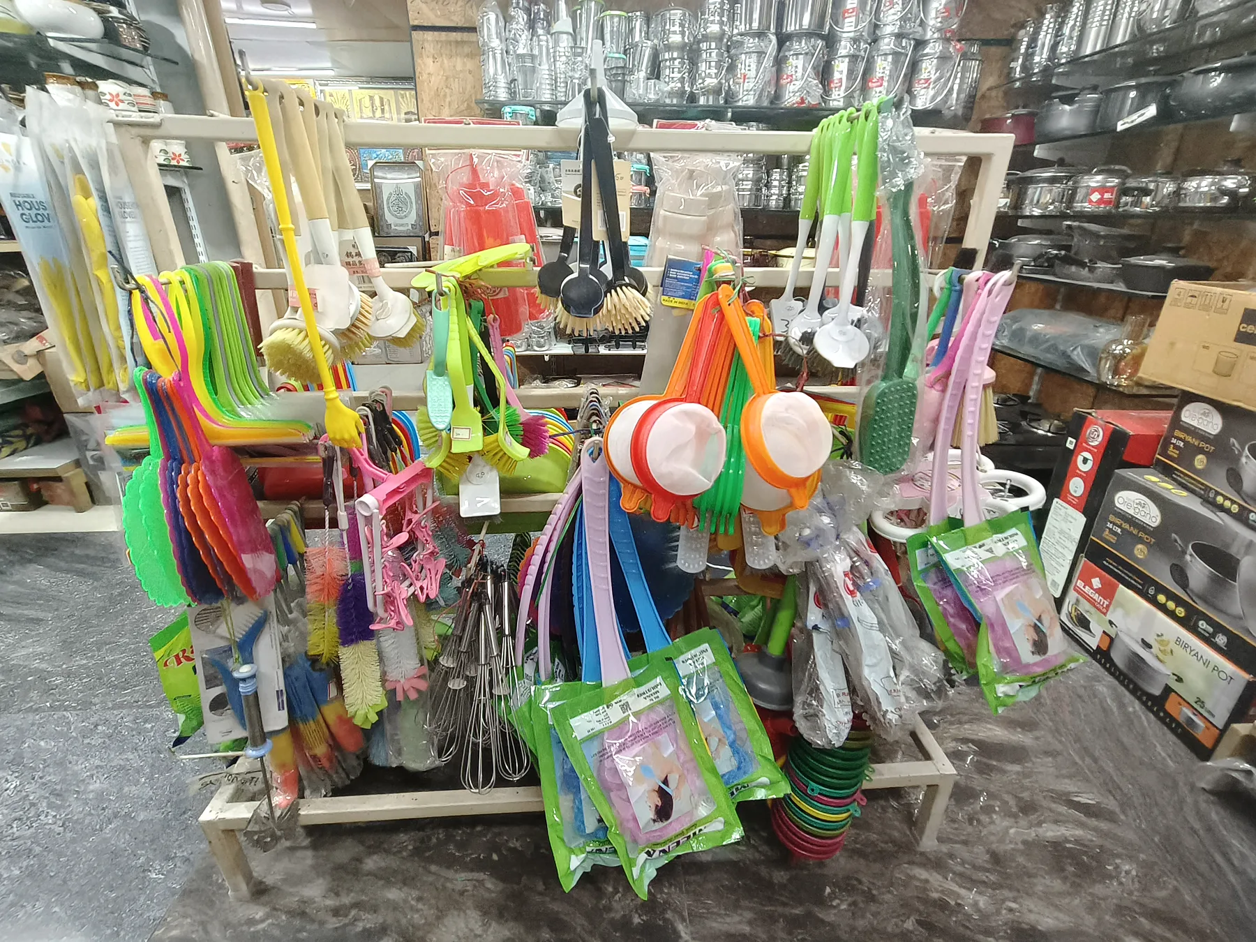 Mops, brushes and cleaning products displayed at SRK