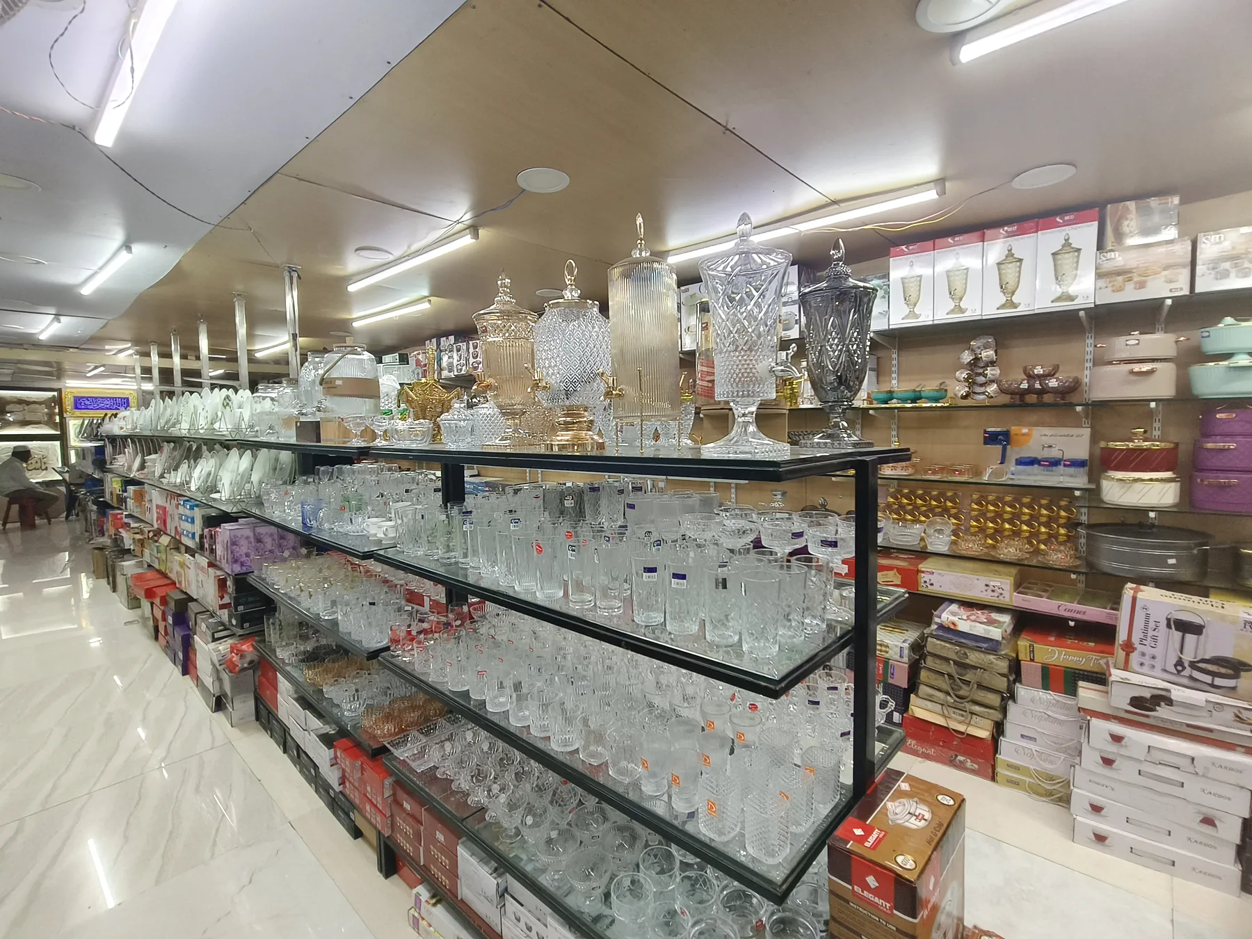 Glassware and household products displayed inside SRK