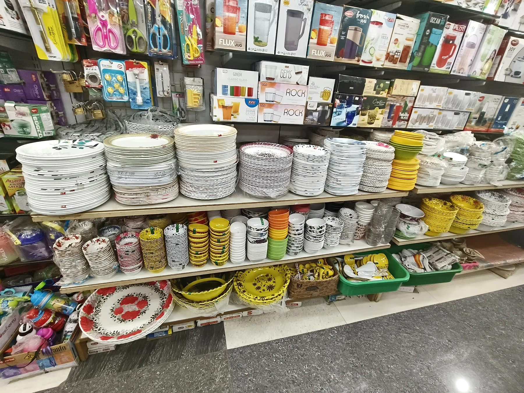 Dinnerware and useful household products displayed inside SRK
